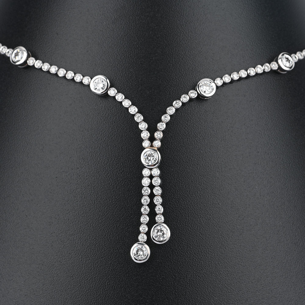 Collier,9 Brillanten ca. 1,44 ct, 62 Brillanten ca. 1,24 ct, WG750 ca. 42,3 g, Länge ca. 45 cm