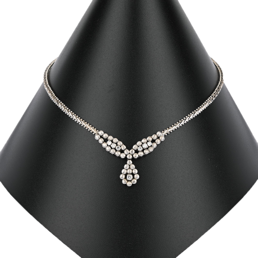 Collier, 7 Brillanten 0,50 ct, WG585 ca. 31,9 g, Länge ca. 44 cm