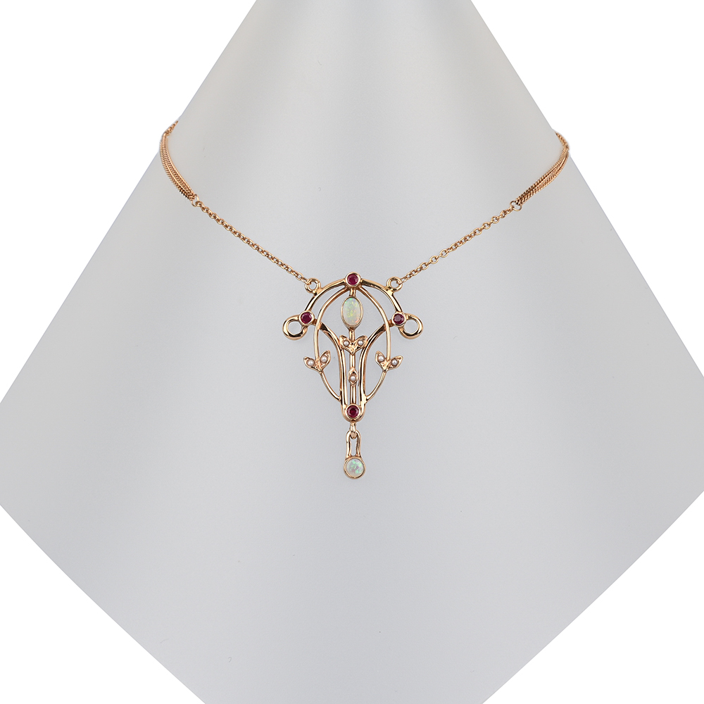Collier "Jugendstil", 2 Opale, 4 Rubine und Saatperlen, Rotgold 585 ca. 8,2 g, Länge ca. 48 cm - Herstellerpunze HJM - H.J. Müller Collection, Münchengladbach