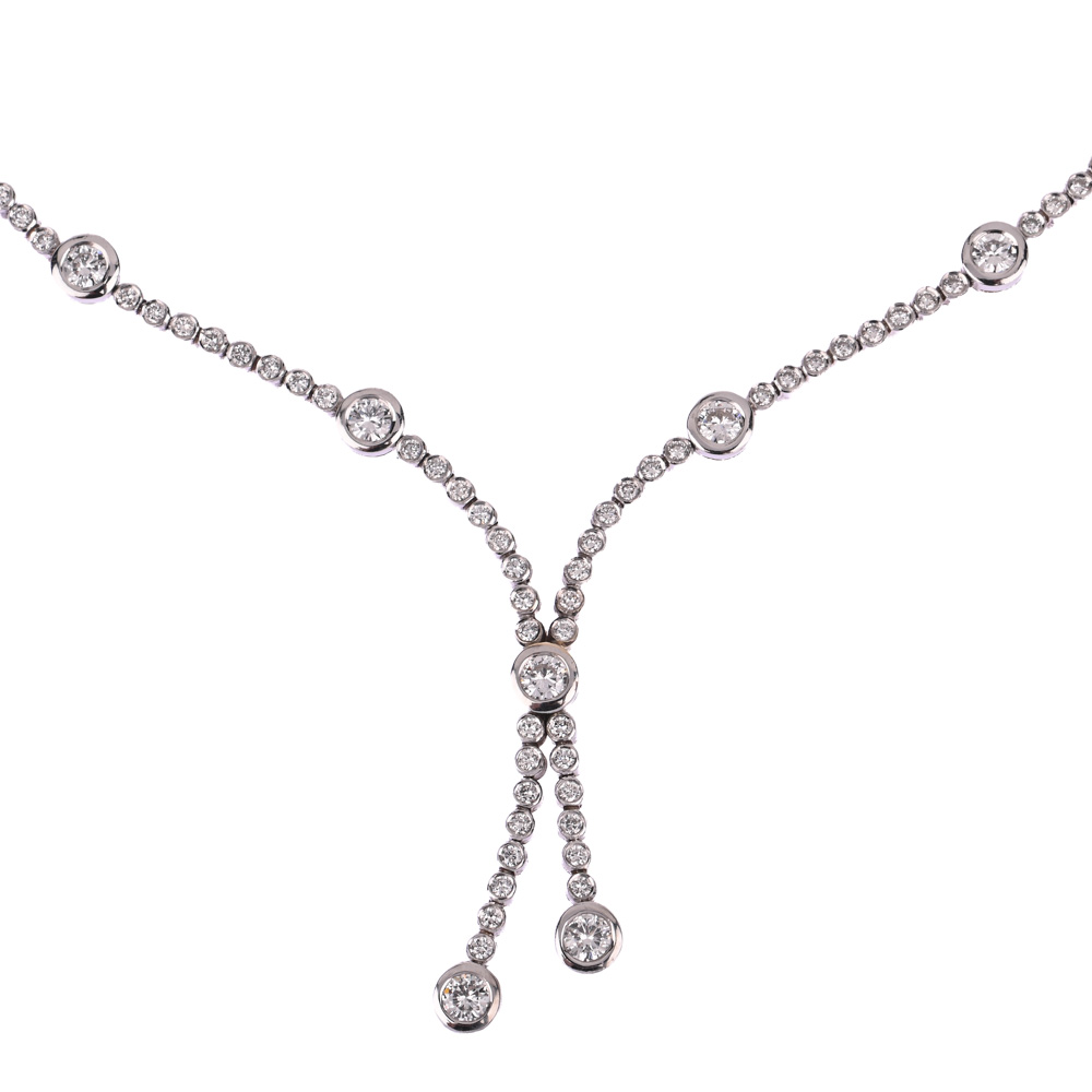 Collier,9 Brillanten ca. 1,44 ct, 62 Brillanten ca. 1,24 ct, WG750 ca. 42,3 g, Länge ca. 45 cm